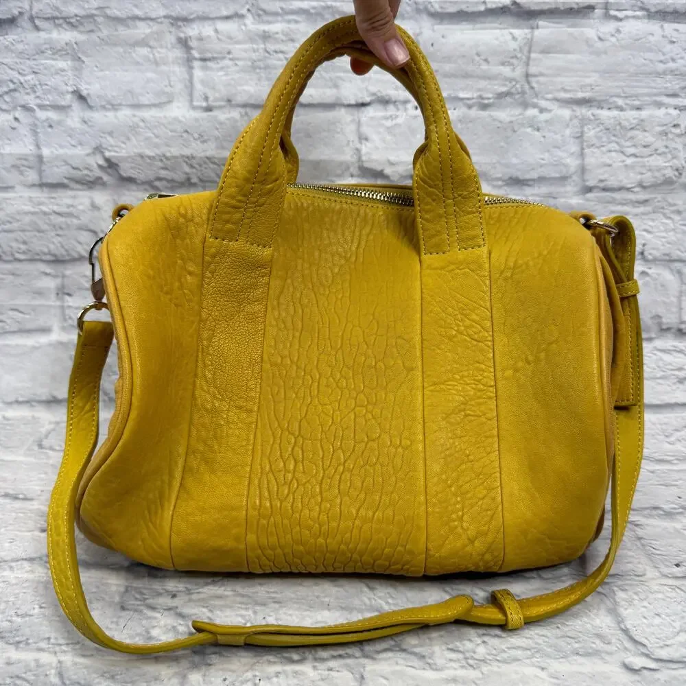Alexander Wang Rocco Duffel Bag Mustard Yellow Pebbled Leather Studded Bottom